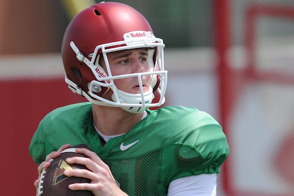 Arkansas quarterback Ricky Town participates in a drill during practice Saturday, Aug. 6, 2016, at the football practice field on the university campus in Fayetteville.