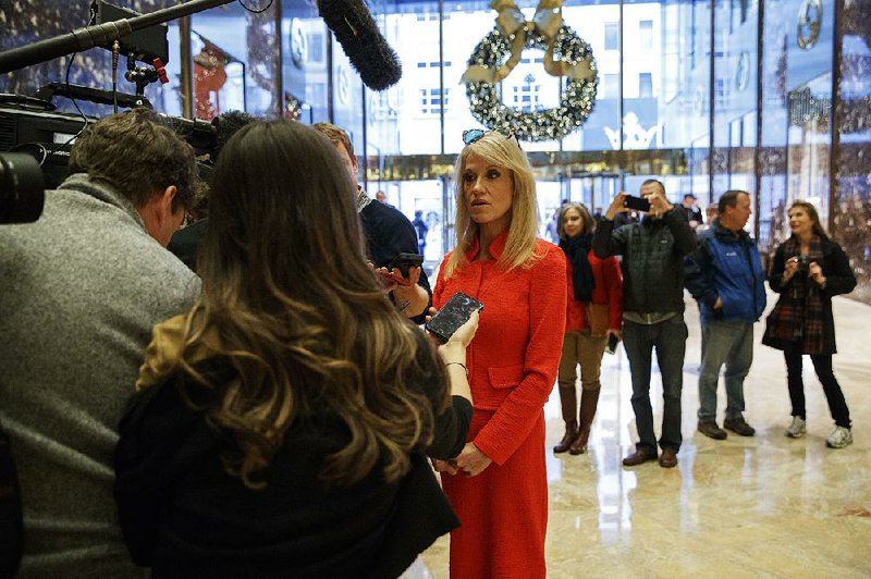 Kellyanne Conway, senior adviser to President-elect Donald Trump, talks to reporters Sunday at Trump Tower in New York.