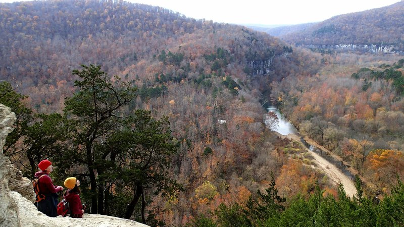 Karen Mowry (left) and Thao Nguyen enjoy a vista along the Goat Trail high above the Buffalo National River. The outing was Thao’s rst hike.