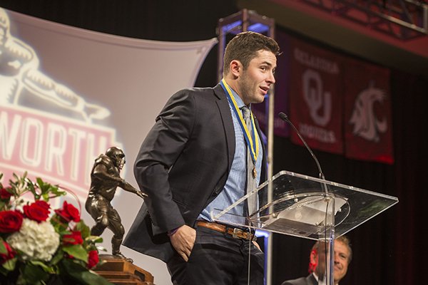 Baker Mayfield accepts the 2016 Burlsworth Trophy on Monday, Dec. 5, 2016, at the Northwest Convention Center in Springdale. Mayfield, Oklahoma junior quarterback, won the award for the second straight year.