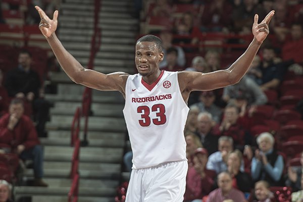 Arkansas center Moses Kingsley celebrates during the second half of a game against Houston on Tuesday, Dec. 6, 2016, in Fayetteville. 