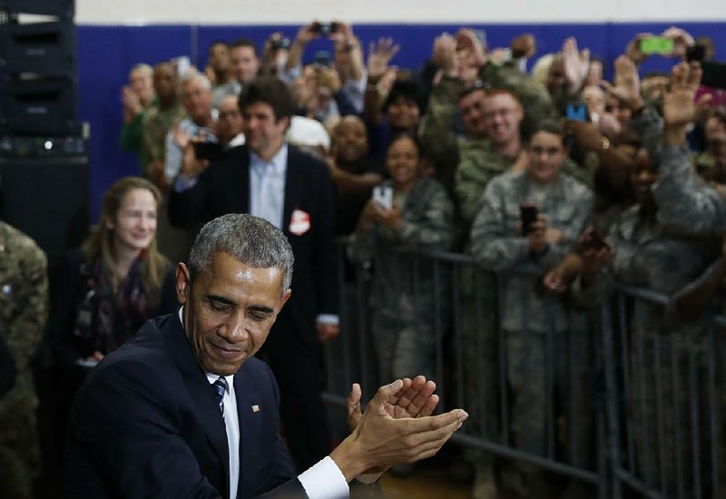President Barack Obama turns to leave after speaking to and greeting service members Tuesday at MacDill Air Force Base in Tampa, Fla.