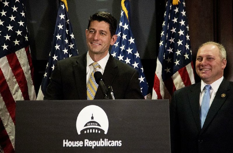 House Speaker Paul Ryan (left), at a news conference Tuesday with House Majority Whip Steve Scalise of Louisiana, said the proposed budget bill would keep the government running through April.