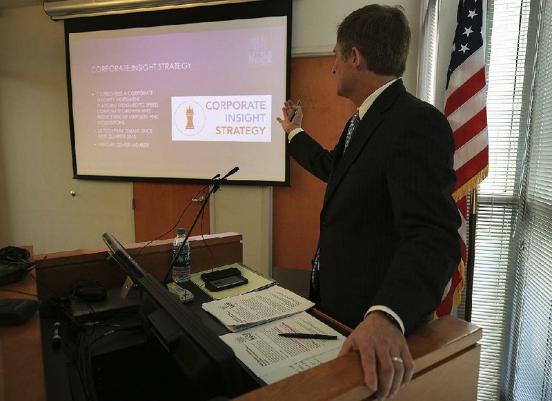 Brent Birch, executive director of the Little Rock Technology Park, unveils some of the tenants Tuesday that will move into the facility in March.