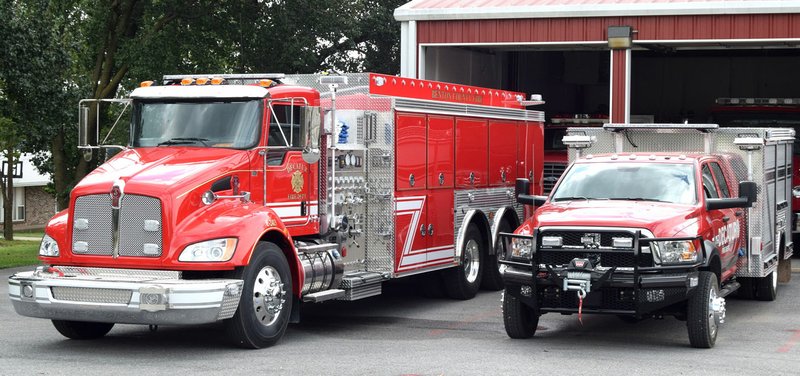 Photo by Mike Eckels The two new units of the Decatur Fire Department were on display Sept. 16 in front of the main fire station on Maple Ave. in Decatur. E-2413 (left) is a 2016 tanker truck which the department acquired in early September. Rescue 2451 (right) went into service in mid May.