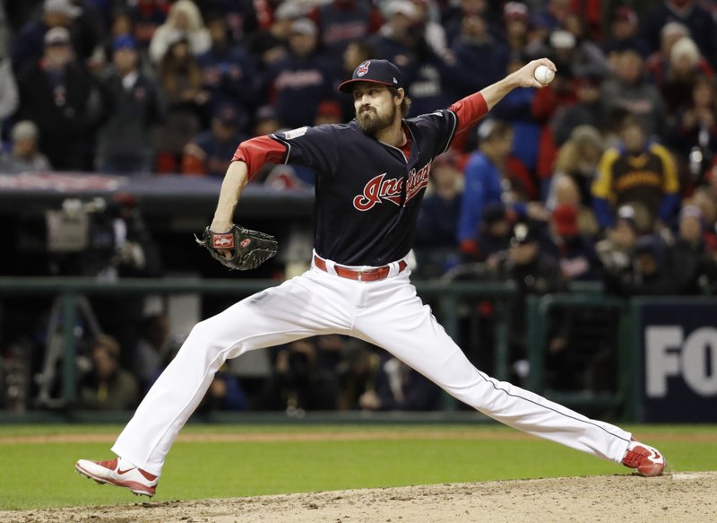  In this Oct. 25, 2016, file photo, Cleveland Indians relief pitcher Andrew Miller throws during the seventh inning of Game 1 of the Major League Baseball World Series against the Chicago Cubs, in Cleveland. 