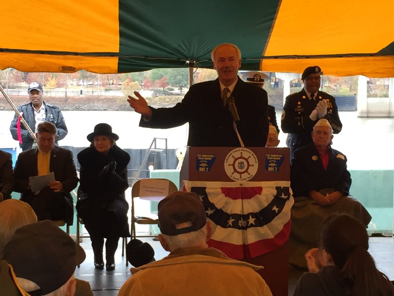 Gov. Asa Hutchinson speaks Wednesday at the Arkansas Maritime Museum at an event marking the 75th anniversary of the Pearl Harbor attack. 