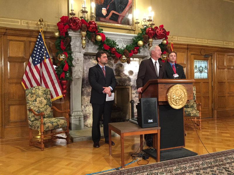 Gov. Asa Hutchinson speaks Wednesday, Dec. 7, at the state Capitol in Little Rock. 