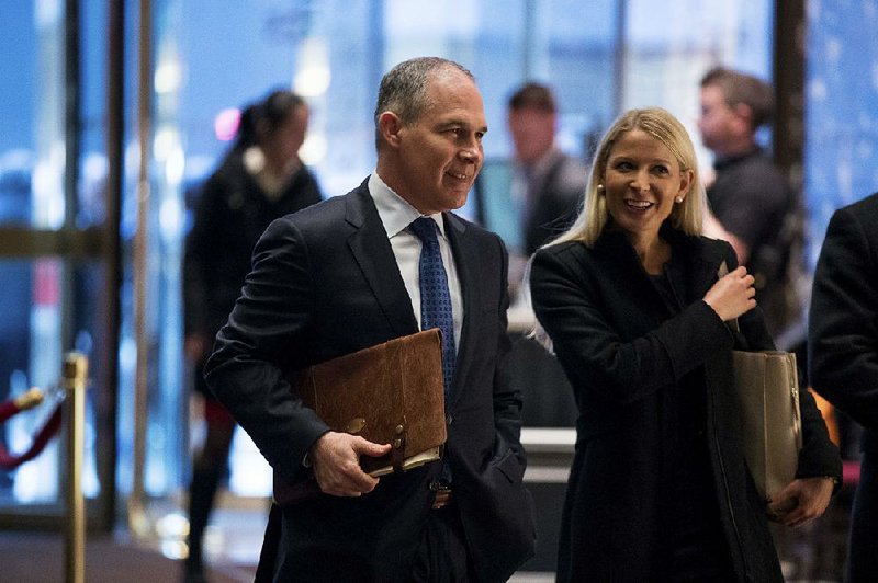 Oklahoma Attorney General Scott Pruitt, President-elect Donald Trump’s choice to lead the Environmental Protection Agency, enters Trump Tower in New York on Wednesday. Pruitt is a longtime critic of the agency. 