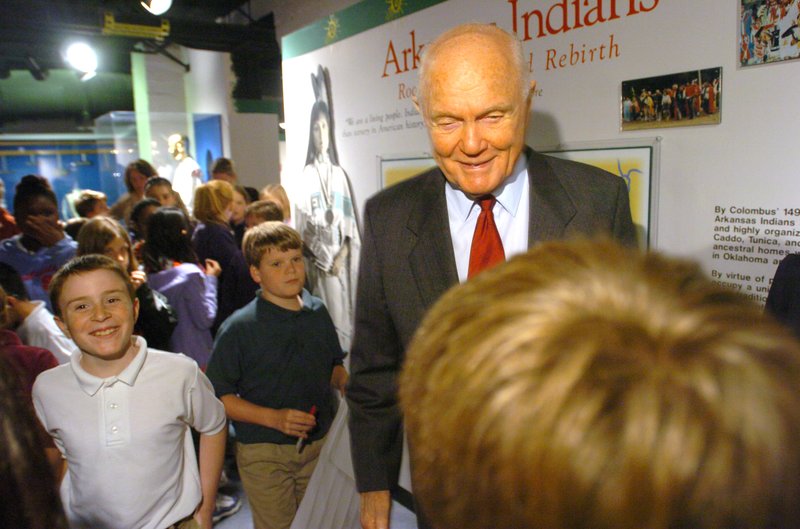 Arkansas Democrat-Gazette/STEVE KEESEE Astronaut and former U.S. Sen. John Glenn of Ohio talks Wednesday to a group of schoolchildren at the Museum of Discovery before the opening of an exhibit called "Space and the Presidency."