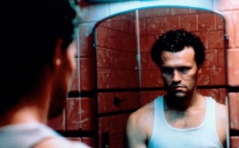 Michael Rooker stars in his fi rst movie role, as the title antihero in John McNaughton’s unrepentantly violent Henry: Portrait of a Serial Killer.