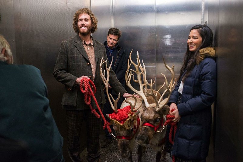 Clay (T.J. Miller), Josh (Jason Bateman) and Tracey (Olivia Munn) are about to play some reindeer games in Office Christmas Party, a comedy about what happens when irresponsible adults make bad decisions with ruminant mammals.