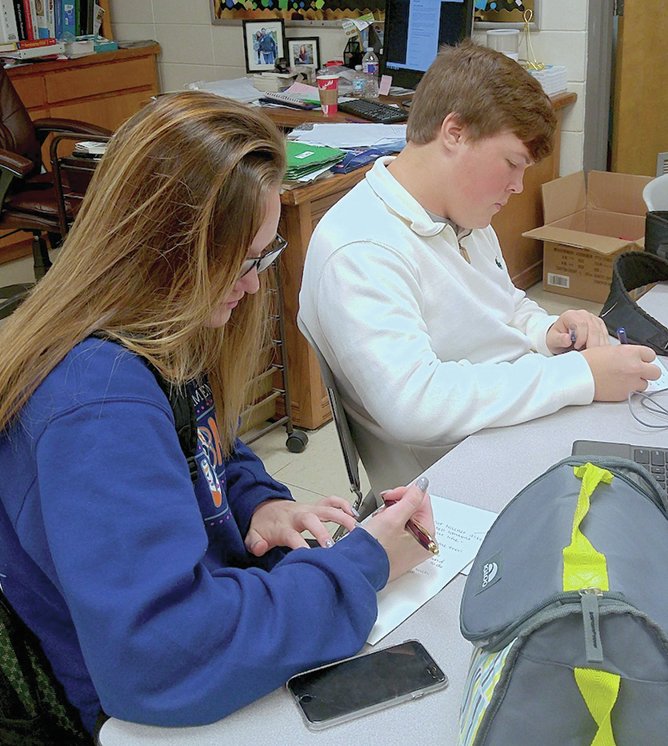 Submitted photo Lake Hamilton High School students Meadow Orrell, left, Cameron Newton and their classmates in Amanda Porter's PACK class wrote letters to those who have made lasting impacts in their lives after they watched a video about gratitude.