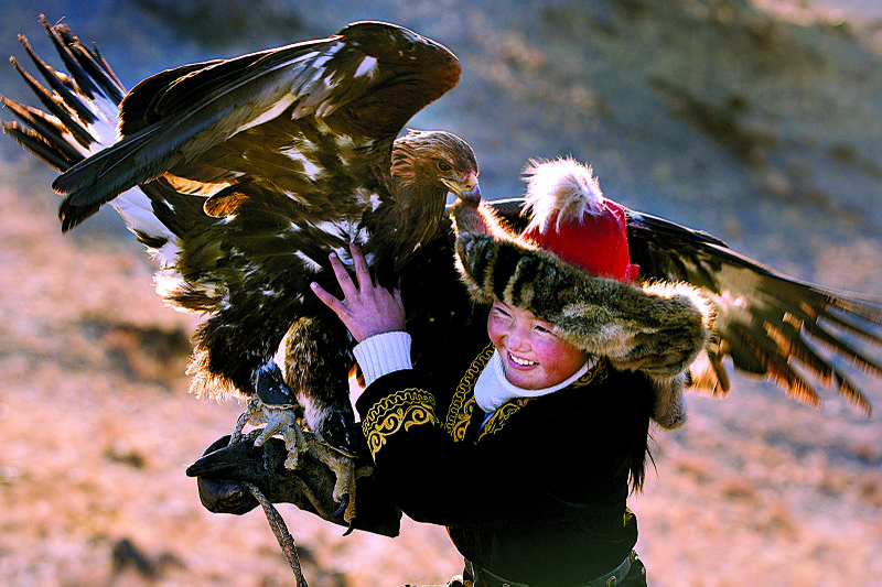 Aisholpan Nurgaiv is an irrepressible 13-year-old year-old living in the mountains of Mongolia determined to be the first girl to ever win a 2,000-year-old eagle hunting competition in Otto Bell’s documentary The Eagle Huntress.