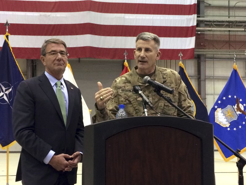 Army Gen. John Nicholson speaks at a news conference with U.S. Defense Secretary Ash Carter, Friday, December 9, 2016 at Bagram Air Base, north of Kabul, Afghanistan. 