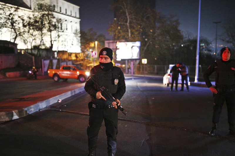 Turkish police officers cordon off the roads leading to the area of the Besiktas football club stadium, in Istanbul, late Saturday, Dec. 10, 2016. Two loud explosions have been heard near the newly built soccer stadium and witnesses at the scene said gunfire could be heard in what appeared to have been an armed attack on police. Turkish authorities have banned distribution of images relating to the Istanbul explosions within Turkey.