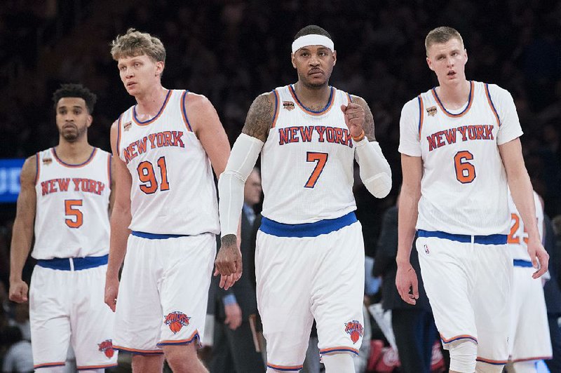 New York forwards Kristaps Porzingis (6) and Mindaugas Kuzminskas (91) are two of three Knicks players who grew up watching their moms play basketball. “When my mom doesn’t see the aggression that I need, she uses a phrase that translates into, ‘You need to eat a razor,’ ” Porzingis said. “I hate that phrase.”