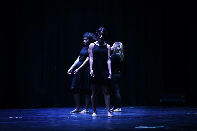 Dancers from the Sareyyet dance company perform onstage in the West Bank city of Ramallahin this photo provided by First Ramallah Dance Company.