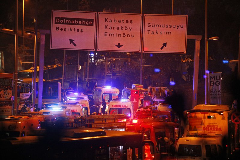 Rescue services rush to the scene of explosions near the Besiktas football club stadium, following at attack in Istanbul, late Saturday, Dec. 10, 2016. 