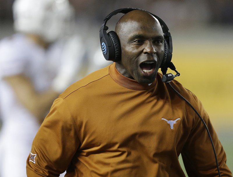 FILE - In this Saturday, Sept. 17, 2016, file photo, Texas coach Charlie Strong yells during the first quarter of an NCAA college football game against California in Berkeley, Calif. (AP Photo/Ben Margot, File)