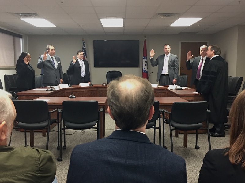 Members of the Arkansas Medical Marijuana Commission are sworn in Monday, Dec. 12, 2016 in Little Rock during the commission's first meeting.