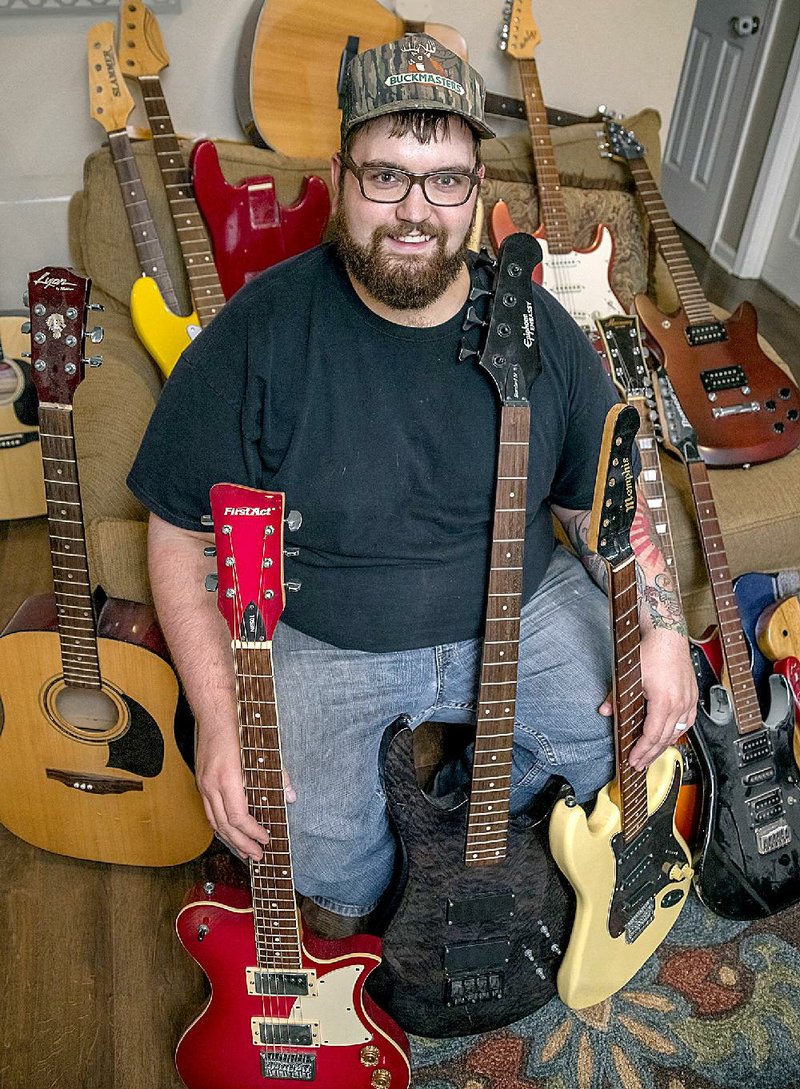 Stephen Rowland is refurbishing guitars for his Project Give A Guitar that he hopes to donate to young people who may not be able to afford a new one.
