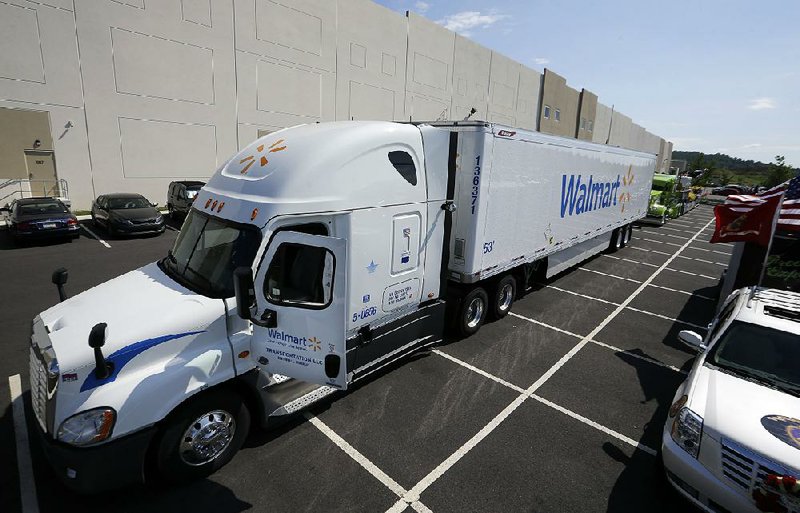 A Wal-Mart truck is parked in front of a distribution center last year in Bethlehem, Pa. Wal-Mart is testing the use of cameras inside some of its commercial vehicles.