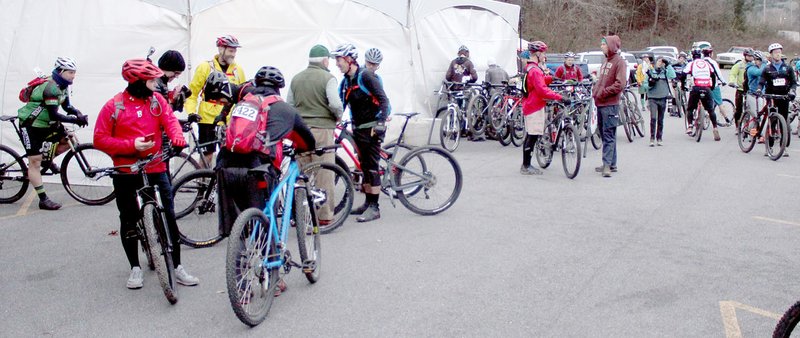 Keith Bryant/The Weekly Vista Riders gather at the Blowing Springs trailhead to start the Back 40 bike race at about 7 a.m.