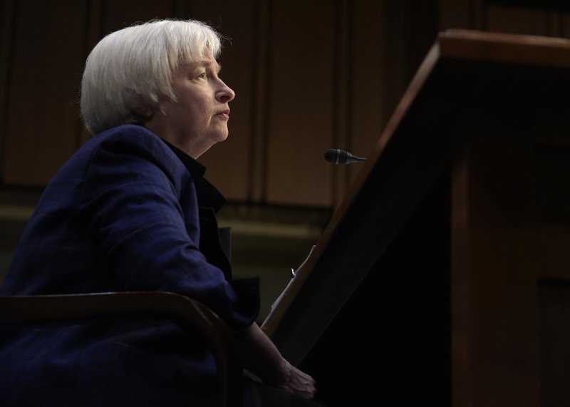 FILE - In this Thursday, Nov. 17, 2016, file photo, Federal Reserve Chair Janet Yellen testifies on Capitol Hill in Washington, before the Joint Economic Committee. A full year after the Federal Reserve raised a key interest rate for the first time in nearly a decade, it is widely expected that they are finally ready to raise rates again at their final meeting of 2016. But the real anticipation revolves around how the central bank plans to respond to the political tsunami that voters have delivered with the election of Donald Trump. (AP Photo/Susan Walsh, File)