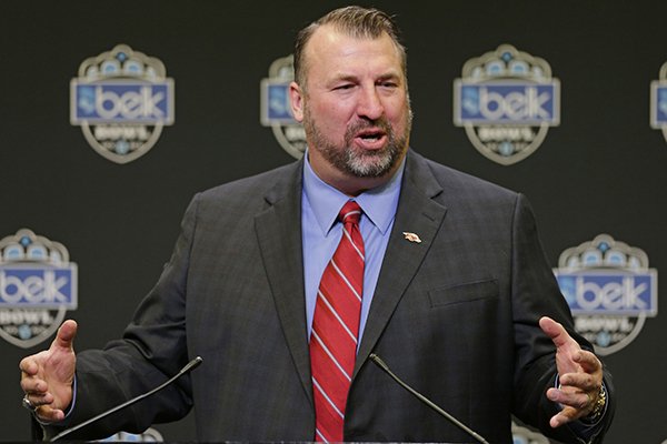 Arkansas head coach Bret Bielema answers a question during a news conference for the Belk Bowl NCAA college football game in Charlotte, N.C., Tuesday, Dec. 13, 2016. The game, between Arkansas and Virginia Tech, will be played on Dec. 29, 2016. (AP Photo/Chuck Burton)

