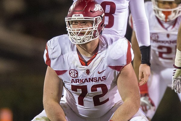 Arkansas center Frank Ragnow reads the defense during a game against Mississippi State on Saturday, Nov. 19, 2016, in Starkville, Miss. 