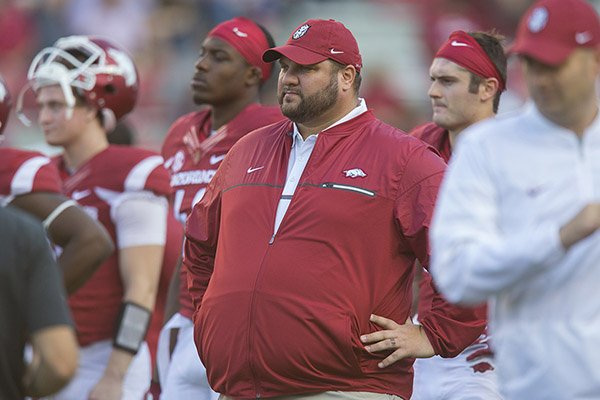 Arkansas offensive line coach Kurt Anderson watches warmups prior to a game against LSU on Saturday, Nov. 12, 2016, in Fayetteville. 