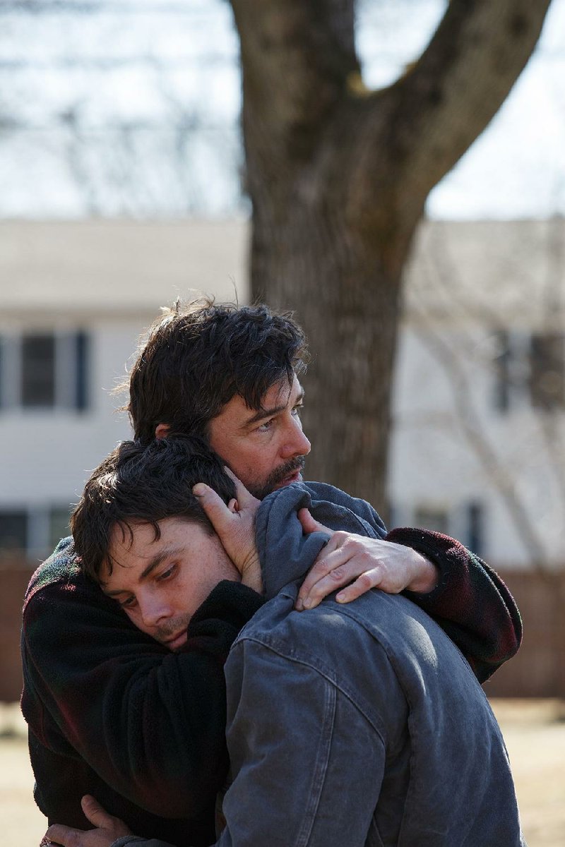 Joe (Kyle Chandler) comforts his little brother Lee (Casey Affleck) after an unspeakable tragedy in Manchester by the Sea, Kenneth Lonergan’s drama about a grieving working-class man asked to take on a huge responsibility.
