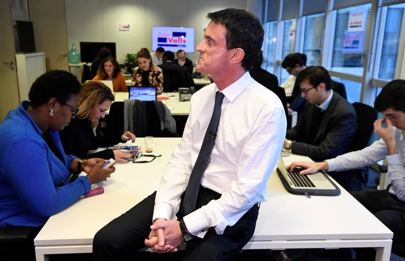 Former French Prime Minister Manuel Valls, now candidate for the socialist party primary election, is pictured during the inauguration of his campaign headquarters, Wednesday Dec. 14, 2016, in Paris.