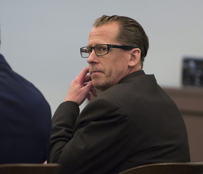 FILE - In this Nov. 16, 2016, file photo, Steven Dean Gordon, a convicted sex offender charged with raping and killing four Southern California women while he wore an electronic monitor, listens during opening statements at his trial in Santa Ana, Calif. 