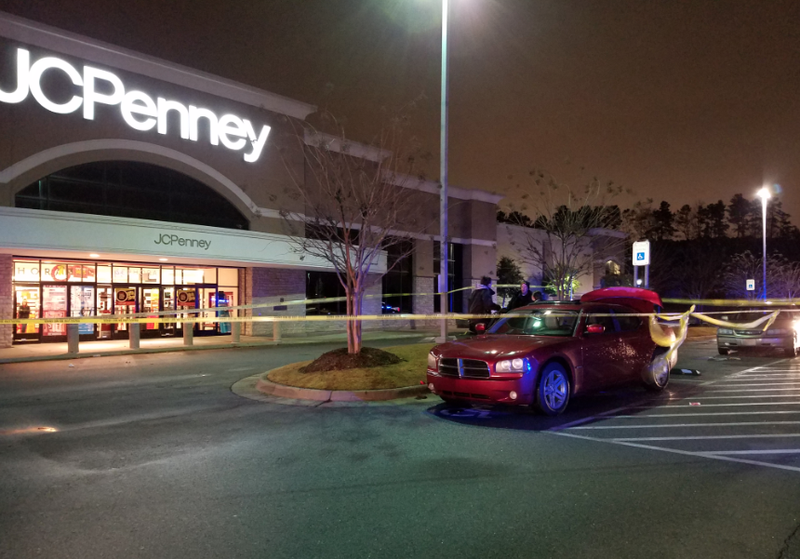 Crime-scene tape marks off a vehicle a young boy was riding in when he was fatally shot Saturday in Little Rock, authorities said.