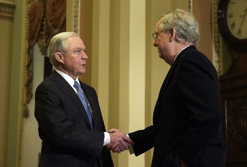 Sen. Jeff Sessions (left), shown being greeted by Senate Majority Leader Mitch McConnell after a Nov. 30 meeting on Capitol Hill, hopes to ease concerns from his Democratic colleagues in his confirmation hearing for attorney general by emphasizing civil-rights concerns throughout his career.