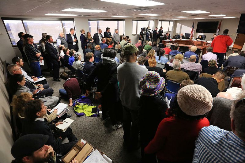People pack the room where the newly formed Medical Marijuana Commission met Tuesday in Little Rock. The commission, in its second meeting, decided how many cultivation centers to license for growing marijuana for medical use.