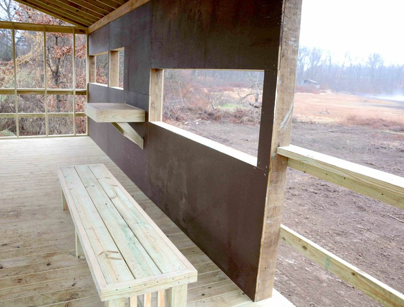 Photo by Terry Stanfill A bench and windows have been provided for enhanced wildlife viewing in the new pavilion being completed at the Eagle Watch Nature area.