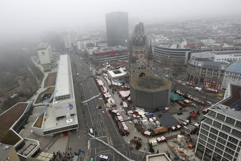 General view of the crime scene in Berlin, Germany, Tuesday, Dec. 20, 2016, the day after a truck ran into a crowded Christmas market and killed several people. (AP Photo/Markus Schreiber)