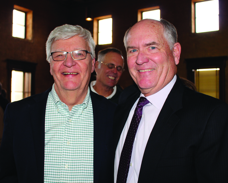 Landers retires: Gene Bramblett, left, a Camden attorney, talks with Judge Mike Landers during a reception held Tuesday to honor Landers on his retirement from the bench. 