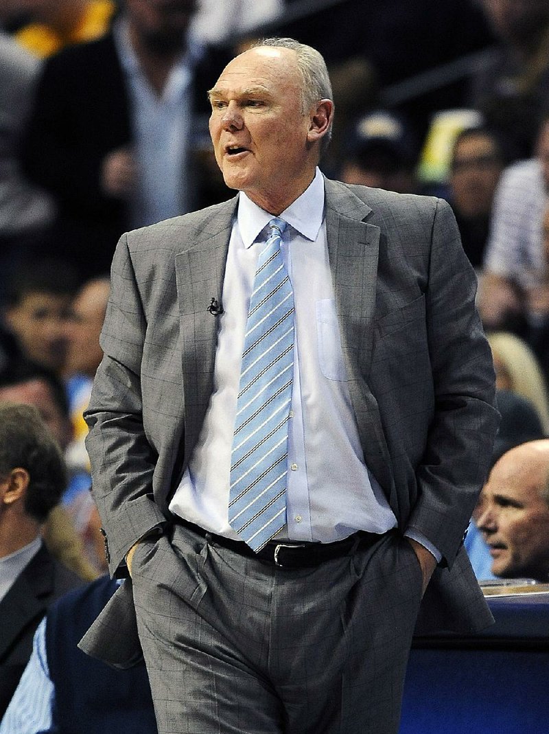 Former NBA Coach George Karl has released a new book in which he took shots at former players Kenyon Martin
and Carmelo Anthony, which has drawn criticism from Martin, especially about how they were raised.