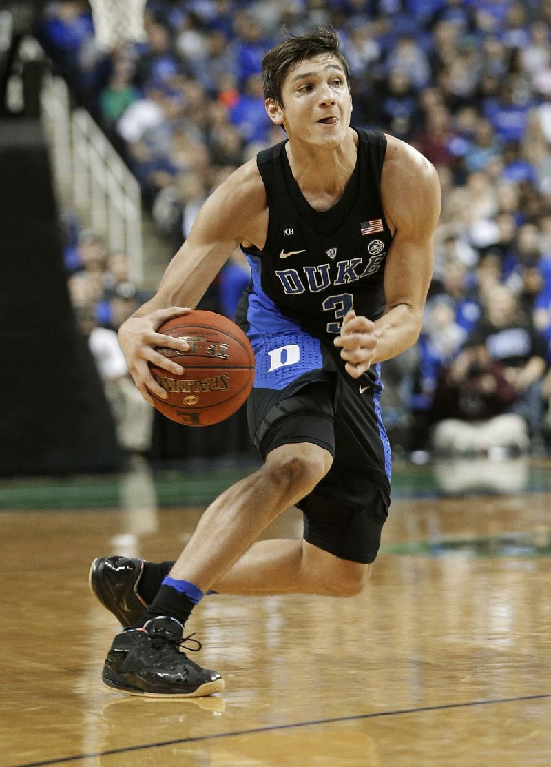 Duke's Grayson Allen (3) brings the ball up the court against Elon in the first half of an NCAA college basketball game in Greensboro, N.C., Wednesday, Dec. 21, 2016. 