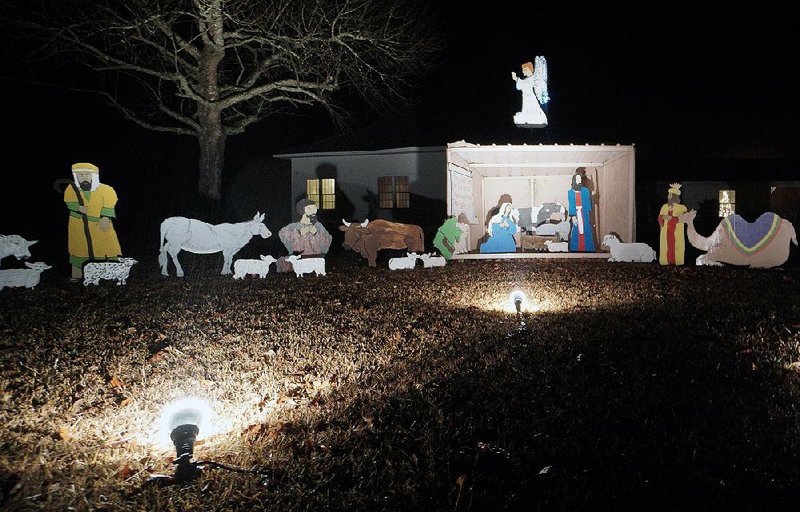 One of several Bible scenes lines Bethlehem Road in Lonoke County on Friday.