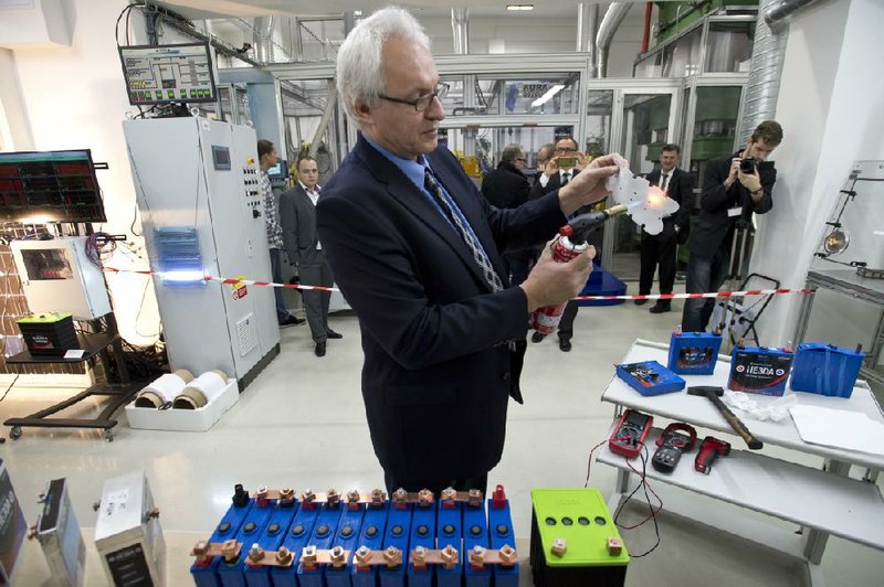 HE3DA President Jan Prochazka describes the qualities of a new battery during the official start of a battery production line in Prague last week.