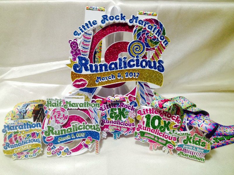 Finishers medals for the 2017 Little Rock Marathon Weekend events share a candy-related “Runalicious” theme.
