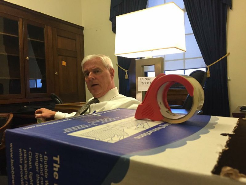 U.S. Rep. Steve Womack, R-Ark., packed up his belongings and moved to another House office building this month. The sign on the lamp informs movers that it’s one-of-a-kind.