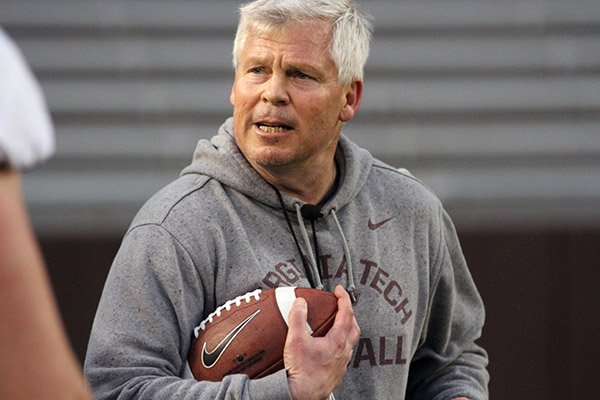 Virginia Tech special teams coach James Shibest works with players during a 2016 practice in Blacksburg, Va. Shibest played for Arkansas from 1983-86 and was a Razorbacks assistant coach from 2000-07.