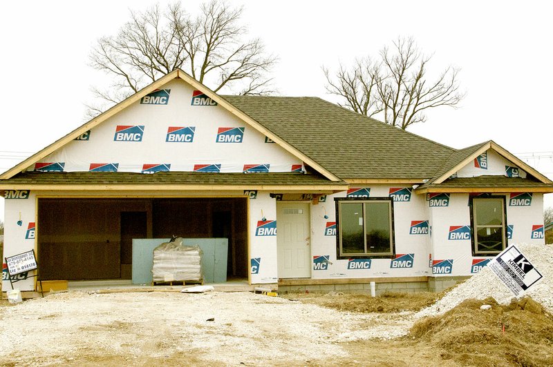 LYNN KUTTER ENTERPRISE-LEADER Several houses are under construction in Battlefield Estates in Prairie Grove, including this one on Sebastian Lane. Prairie Grove set a new record for housing starts in 2016.