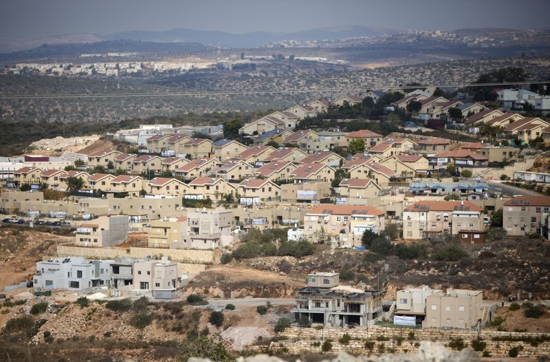 FILE -- This Oct. 22, 2016 file photo, shows a general view of housing in the Israeli settlement of Revava, near the West Bank city of Nablus. 